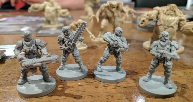 The squad. Note that the weapons displayed in their hands are just cosmetic; any marine can carry any weapon they want in the actual game.